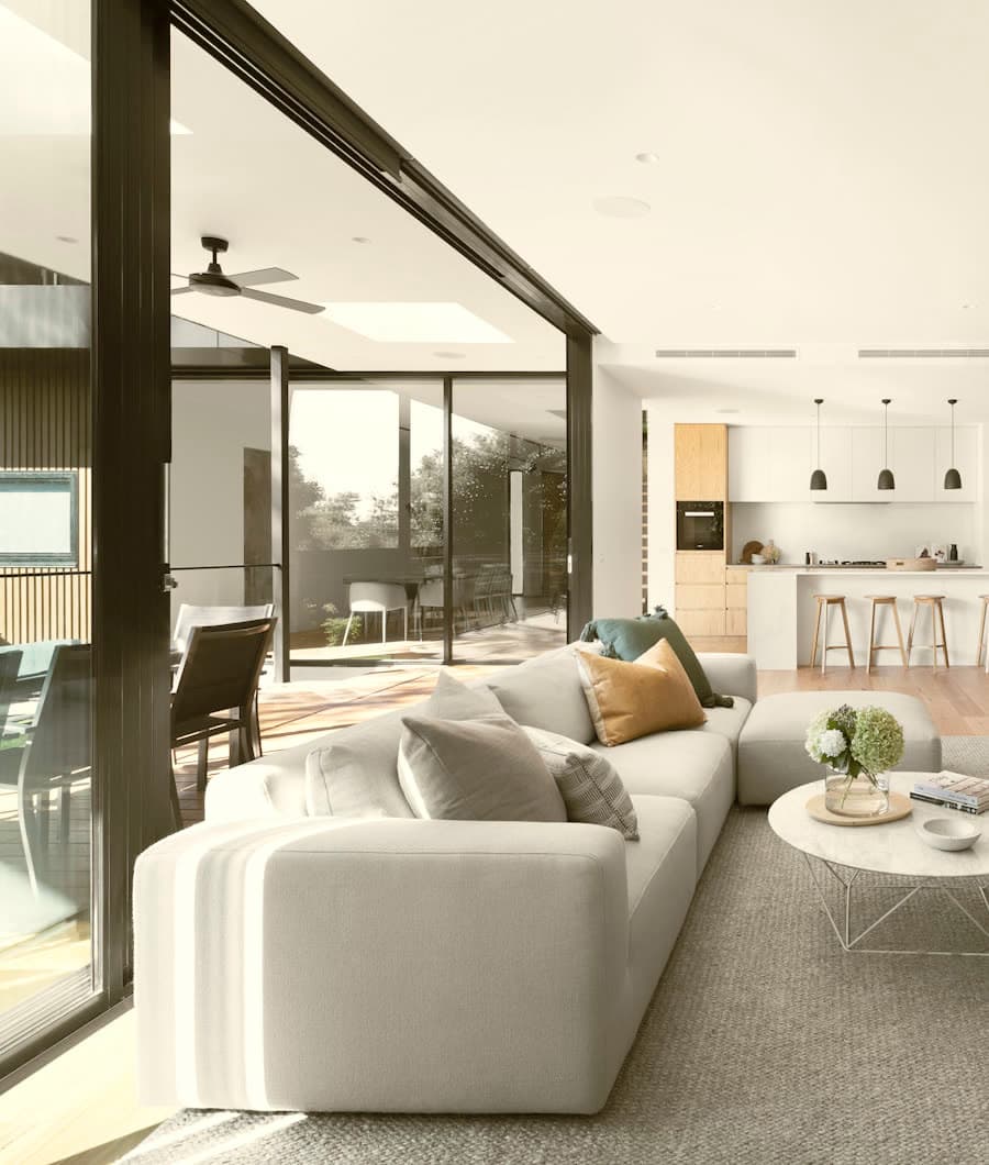 Open kitchen and living volume under a raked ceiling